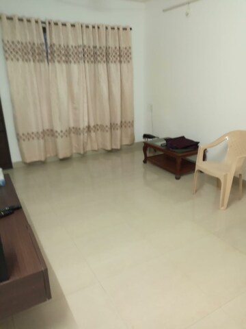 Living Room in 2 BHK Apartment at Woodland Avenue, Kothrud – for Rent
