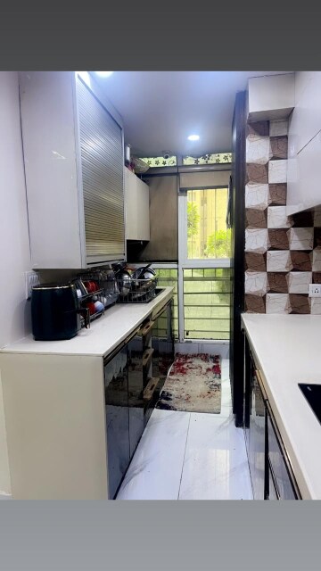 Kitchen in 3.5 BHK Apartment at Paras Seasons, Sector 168 – for Rent