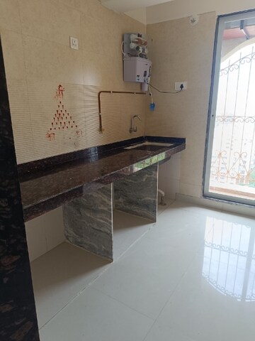 Kitchen in 2 BHK Apartment at Tharwani Meghna Montana, Ambernath West – for Rent