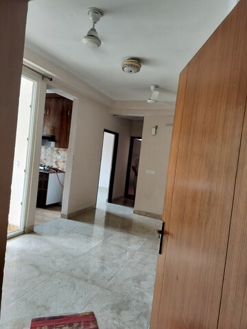 Building Lobby in 2.5 BHK Apartment at Amrapali Golf Homes, Sector 4 Greater Noida – for Rent