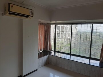Room in 2 BHK Apartment at Bhanushanti Complex, Malad East – for Rent