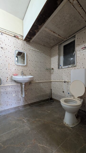 Bathroom in 3 BHK Apartment at Royal Palms Ruby Isle Apartment, Goregaon East – for Rent