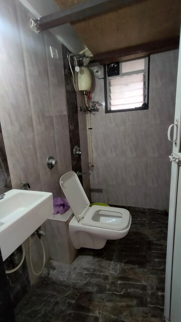 Bathroom in 2 BHK Apartment at Lotus Lotus Link Square, Malad West – for Rent