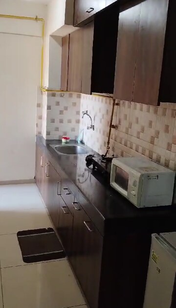 Kitchen in 2 BHK Apartment at Wave Dream Homes, Wave City – for Rent