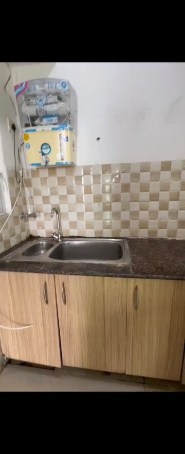 Kitchen in 2 BHK Apartment at Ajnara Integrity, Raj Nagar Extension – for Rent