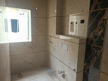 Bathroom in 2 BHK Apartment at Gardenia Golf City, Sector 75 – for Sale