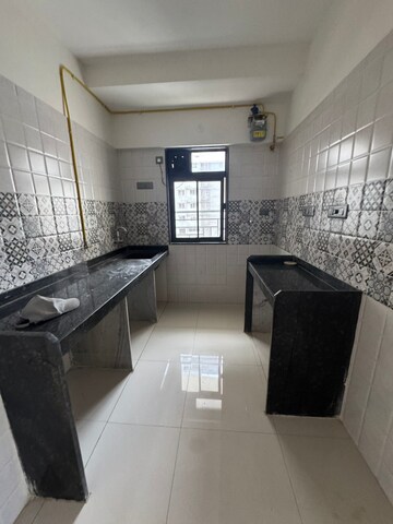 Kitchen in 2 BHK Apartment at Swaroop Marvel Gold, Bhandup West – for Rent