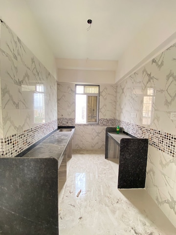 Kitchen in 1 BHK Apartment at DGS Sheetal Tapovan, Malad East – for Sale