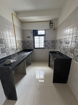 Kitchen in 2 BHK Apartment at Swaroop Marvel Gold, Bhandup West – for Sale