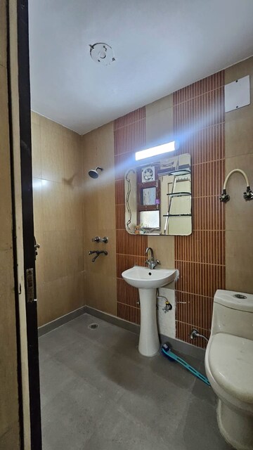 Bathroom in 3 BHK Apartment at Sector 10 Dwarka – for Rent