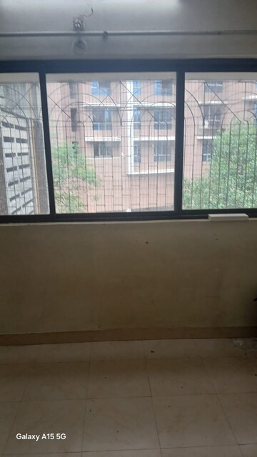 Room in 2 BHK Apartment at Sadguru Complex I, Goregaon East – for Sale