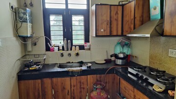 Kitchen in 2.5 BHK Builder Floor at Green Fields Colony – for Rent