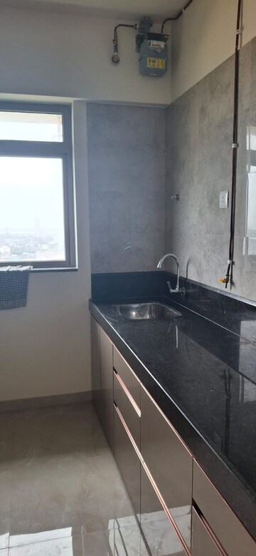 Kitchen in 2 BHK Apartment at Sheth Irene, Malad West – for Rent