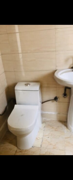 Bathroom in 1 BHK Apartment at Emenox Brave Hearts, Raj Nagar Extension – for Sale