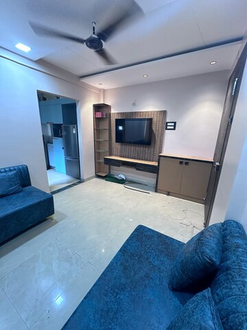 Living Room in 1 BHK Apartment at Swapnapurti CHS Kharghar, Kharghar – for Rent