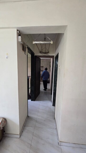 Building Lobby in 1 BHK Apartment at Narmada Kunj CHS, Kharghar – for Rent