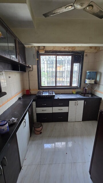 Kitchen in 1 BHK Apartment at Narmada Kunj CHS, Kharghar – for Rent
