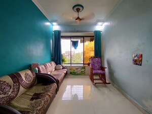 Living Room in 1 BHK Apartment at Om Sai Charan CHS Dombivli, Dombivli West – for Sale