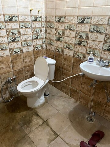Bathroom in 3 BHK Apartment at Deva Road – for Rent
