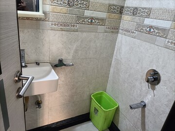 Bathroom in 2 BHK Apartment at Atul Blue Meadows, Andheri East – for Rent