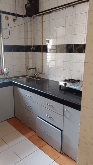 Kitchen in 1 BHK Apartment at JVM Pearl, Kavesar – for Sale