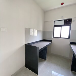 Team Area in 1 BHK Apartment at Runwal Gardens Phase 2, Kalyan Shilphata Road – for Sale