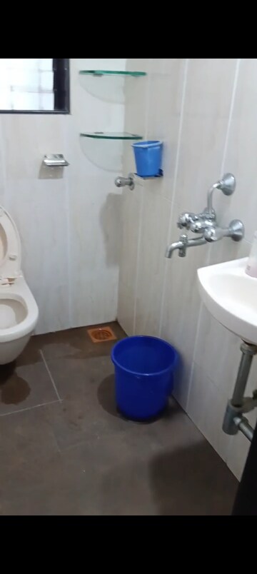 Bathroom in 3 BHK Apartment at Atul Blue Meadows, Andheri East – for Rent