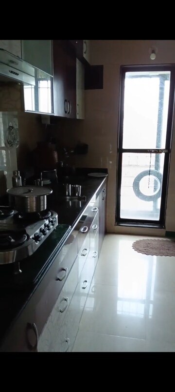 Kitchen in 3 BHK Apartment at Atul Blue Meadows, Andheri East – for Rent