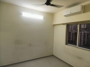 Room in 1 BHK Apartment at Omkar Signet, Malad East – for Sale