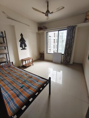 Bedroom in 2 BHK Apartment at Balaji Paradise, Dhayari – for Sale