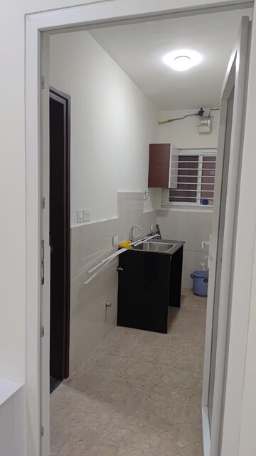 Kitchen in 2 BHK Apartment at Aparna Sarovar Zenith, Nallagandla – for Rent