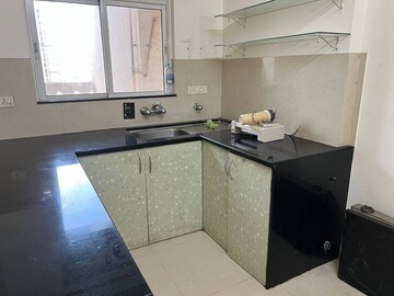 Kitchen in 2 BHK Apartment at Hiranandani Meadows, Manpada – for Rent