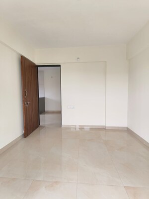 Room in 2 BHK Apartment at The Greenwoods CHS, Dhayari – for Sale