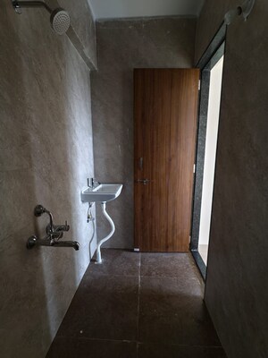 Bathroom in 2 BHK Apartment at The Greenwoods CHS, Dhayari – for Sale