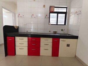 Kitchen in 2 BHK Apartment at Ramkrishna Paradise, Dhayari – for Sale