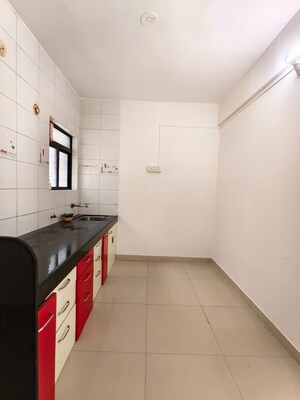 Kitchen in 2 BHK Apartment at Ramkrishna Paradise, Dhayari – for Sale