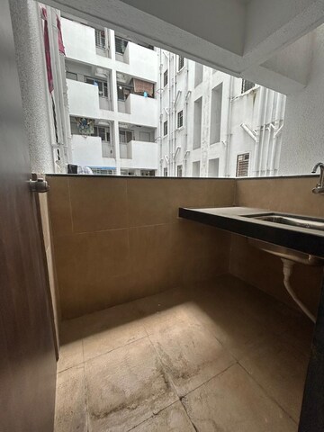 Kitchen in 2 BHK Apartment at Kedar Krishna Kunj Residency, Vadgaon Budruk – for Sale