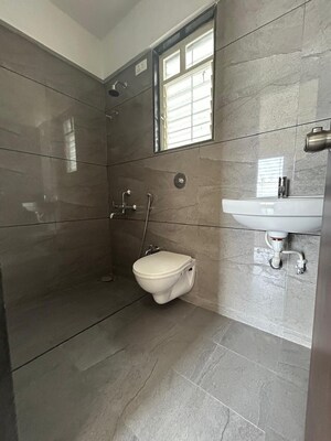 Bathroom in 2 BHK Apartment at Kedar Krishna Kunj Residency, Vadgaon Budruk – for Sale