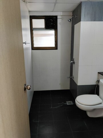 Bathroom in 2 BHK Builder Floor at Paranjape Blue Ridge, Hinjewadi – for Rent