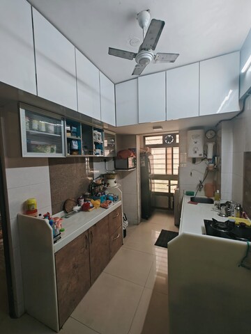 Kitchen in 2 BHK Apartment at Ravi Gaurav Valley, Mira Road – for Sale