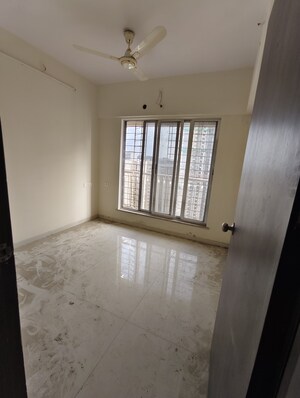 Master Bedroom in 2 BHK Apartment at Unique Poonam Estate Cluster 2, Mira Road – for Sale
