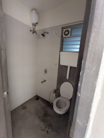 Bathroom in 2 BHK Apartment at Unique Poonam Estate Cluster 2, Mira Road – for Sale