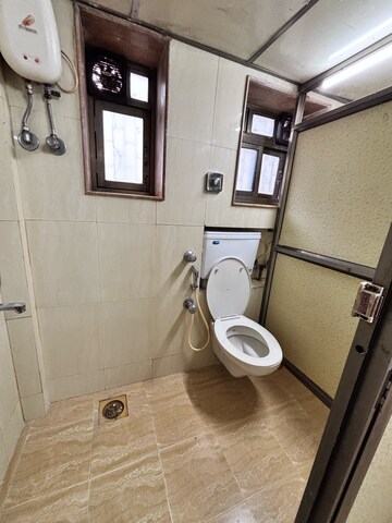 Bathroom in 1 BHK Apartment at Nand Dham CHS Dahisar, Kandarpada – for Rent