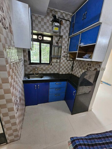 Team Area in 1 BHK Apartment at New Jay Palace, Yari Road – for Rent