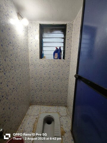 Bathroom in 1 BHK Apartment at Shivratna CHS, Kalwa – for Rent