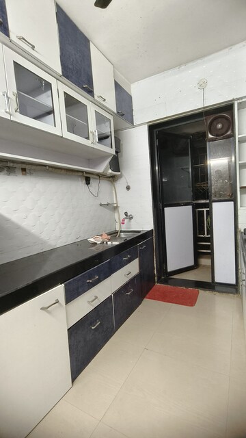 Kitchen in 1 BHK Apartment at Shanti Dham Heights, Parsik – for Rent