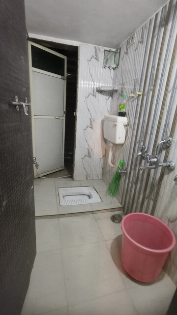 Bathroom in 1 BHK Apartment at Shanti Dham Heights, Parsik – for Rent