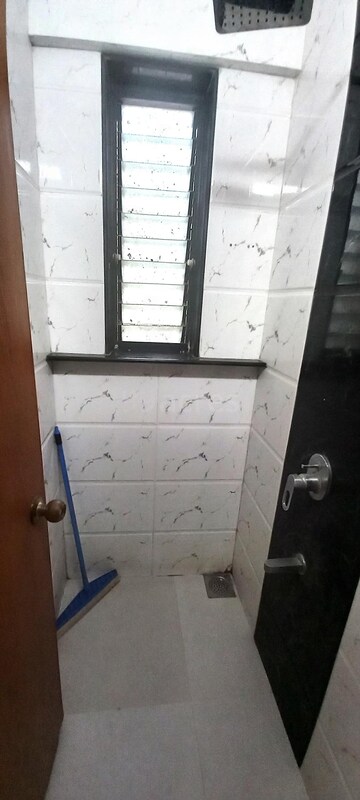 Bathroom in 1 BHK Apartment at Seven Bungalow, Andheri West – for Rent