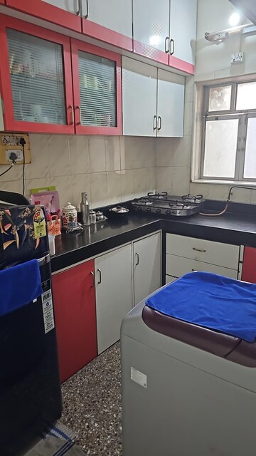 Kitchen in 1 BHK Apartment at Versova Sheetal CHS, Andheri West – for Rent