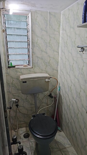 Bathroom in 1 BHK Apartment at Versova Sheetal CHS, Andheri West – for Rent